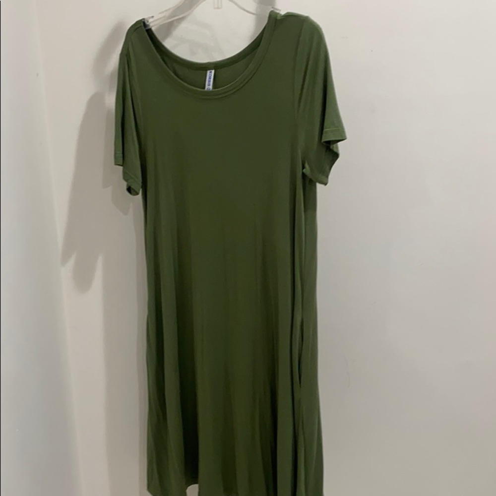 Korsis swing dress with pockets. Never been worn.